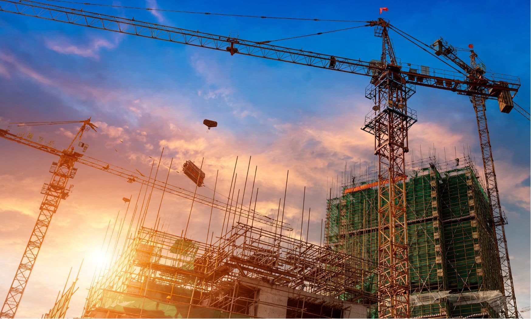 Construction site with modern buildings and crane